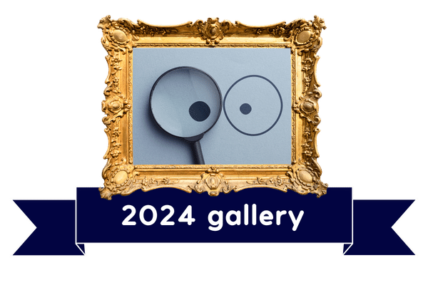 A gold frame with a pair of googly eyes inside with a banner that says '2024 gallery - this is clickable