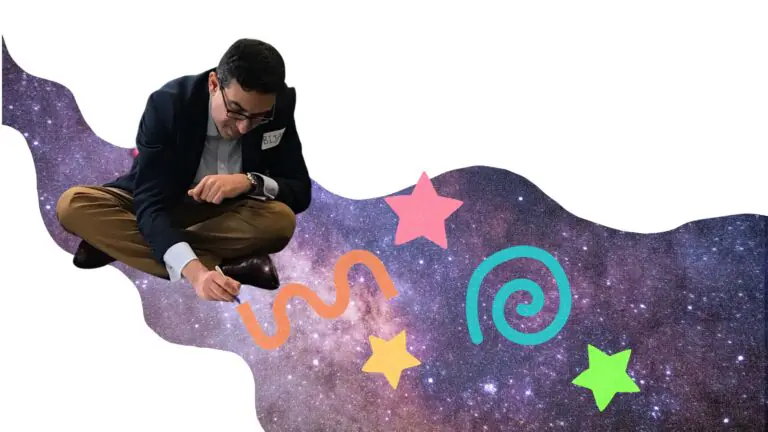 Man sitting on the ground drawing doodles on a background image of space